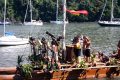 Locals dressed in costume for ceremonial outrigger paddle